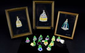 Three 1930's Fashion Illustrations With Butterfly Wing Detail Three framed images of ladies in