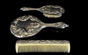 A Vintage Reproduction Art Nouveau Dressing Table Set A 1960's set to include, hand mirror,