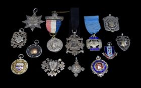 A Very Good Collection of Assorted Antique Silver Fobs / Medals. Some Medals with Enamel Finish.