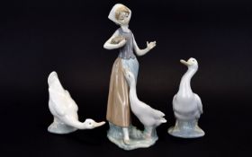 Lladro Figure ' Girl with Duck ' Model No 1052. Issued 1991 - 1993. Height 9.5 Inches + Two Nao by