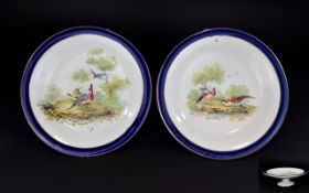 Royal Doulton A Pair Of Footed Shallow Dishes Two ceramic dishes each with cobalt blue border and