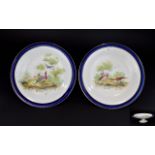 Royal Doulton A Pair Of Footed Shallow Dishes Two ceramic dishes each with cobalt blue border and