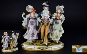 Sitzendorf Hand Painted Early 20th Century Porcelain Figure Group of a ' Dandy ' Gentleman and Two