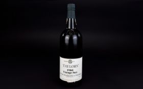 A Bottle Of Taylor's 1980 Vintage Port 75cl bottle, capsule in good condition, seal intact,