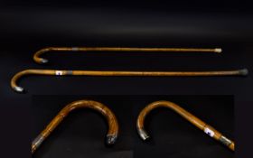 Pair Of Silver Banded Walking Canes