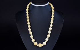 Antique Period Ivory Bead Necklace of Graduated Form,