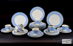 Doulton Modern Part Teaset comprising side plates, cups and saucers and dinner plates.