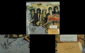 Travelling Wilburys autographs on LP Record signed on cover by Tom Petty,