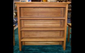 A Contemporary Solid Oak Bookcase Large three shelf unit with golden patina.