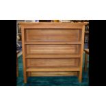 A Contemporary Solid Oak Bookcase Large three shelf unit with golden patina.