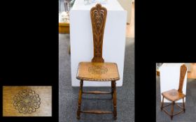 An Early 20th Century Spinning Chair Oak spinning chair with turned legs,