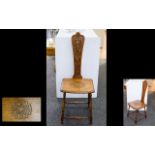 An Early 20th Century Spinning Chair Oak spinning chair with turned legs,