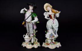 Sitzendorf Pair of Mid 20th Century Hand Painted Porcelain Figures of Male and Female Gardeners In