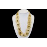 A Vintage Art Deco Ivory Necklace A statement necklace hand strung with thirteen smooth overlapping,