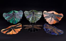 A Collection Of Reproduction Tiffany Glass Panels Six in total each with central dragonfly design,