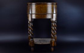 Antique Oak Workbox On barley twist legs with semicircular stretcher and beaded edge detail.