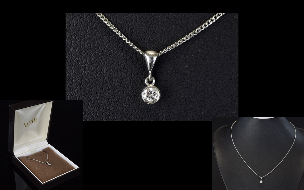 Platinum Set Single Stone Diamond Pendant with Attached Platinum Chain. Both Marked 950 Platinum.