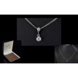 Platinum Set Single Stone Diamond Pendant with Attached Platinum Chain. Both Marked 950 Platinum.