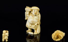Japanese Late 19th Century Signed And Excellent Quality Small Carved Ivory Figure of ' Daikoku '