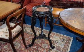 Antique Plant Stand Fashioned in ebonised wood with trefoil legs, carved,