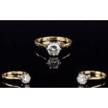 18ct Gold Set Single Stone Diamond Ring. The Brilliant Cut Round Diamond of Good Colour and Clarity.