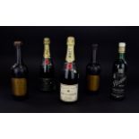 Five Bottles of Vintage Alcohol comprising Moet & Chandon Bottle of Champagne one dated 1980,