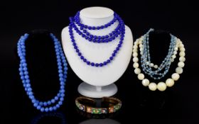 A Collection Of Vintage Glass Bead Jewellery Five items in total to include extra long 1920's blue