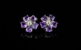 Amethyst Flower Cluster Stud Earrings, each earring made up of five deep rich purple, heart cut