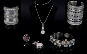 A Collection Of Silver And Metal Costume Jewellery Six items in total to include two chunky silver