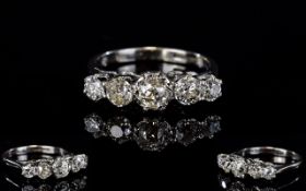 Antique Platinum Set 5 Stone Diamond Ring. The Cushion Cut Diamonds of Good Colour and Clarity.