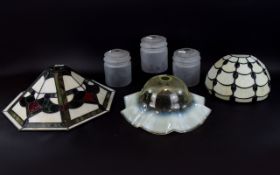 A Collection Of Reproduction Tiffany Style Glass Shades Six items in total to include Tiffany style