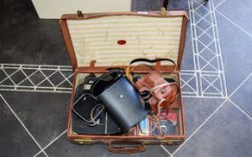 Small Suitcase Containing Collection of Cameras to include a Prinz and also a Zenit,