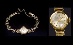 Avia Ladies 9ct Gold Case Mechanical Wind up Wrist Watch with Integral 9ct Gold Bracelet.