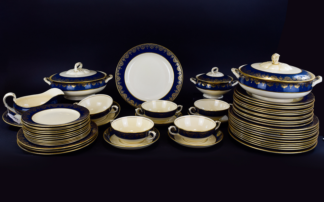 Alderleigh Ware Part Dinner Set, Royal blue and gilt border with a white ground.