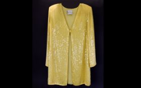 A Ladies Longline Evening Jacket By Frank Usher Sequinned jacket in primrose yellow, embellished