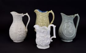 Four Various 19thC Moulded Classical Figure Theme Jugs comprising one cream colour with four