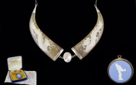 Oriental Silver And Horn Necklace Statement necklace comprising two polished horn section etched