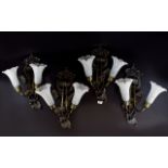 Four Reproduction Art Nouveau Wall Sconces Bronzed wall lights in floral whiplash form each with