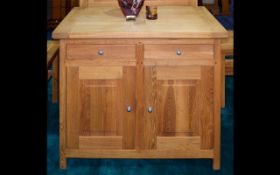 Solid Oak Sideboard Contemporary sideboard with two front cupboards,