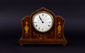 Antique Inlaid Mantle Clock Small mahogany mantle clock with ribbon inlay and neoclassical urn