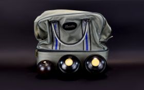 3 Crown Bowls together with a carry bag.