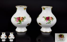 A Pair of Royal Albert Old Country Roses Bud Vases 5 inches in height.