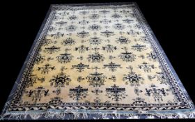 A Vintage Wool Rug Heavyweight woven wool rug with cream ground and repeated black ikat pattern