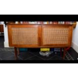 A 1960's Teak Sideboard Long sideboard/buffet with internal drawers, shelves and sliding front doors