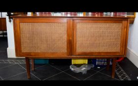 A 1960's Teak Sideboard Long sideboard/buffet with internal drawers, shelves and sliding front doors