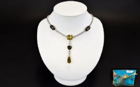 A Citrine Smoky Quartz And White Topaz Sterling Silver Necklace Statement necklace with central v-
