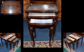 Mahogany Nest of Tables with glass top and cabriole legs. 22 inches high and 22 inches wide.