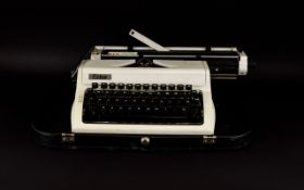 Erika 6 Vintage Portable Typewriter, with black carry case.