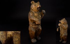 A 10 Inches Tall Black Forest Carved Standing Bear with Open Painted Mouth In Good Order.