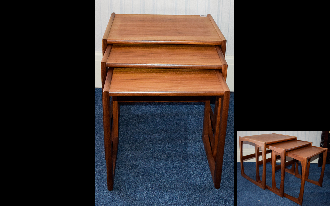 Origna 1970's Nest of Tables. Set of three teak tables of plain form with integral leg detail. 19.